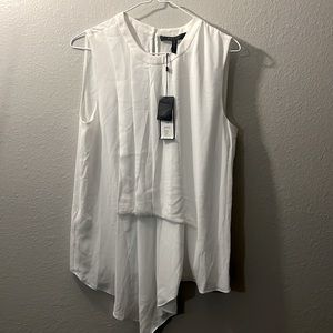 I’m selling a beautiful white BCBG blouse!